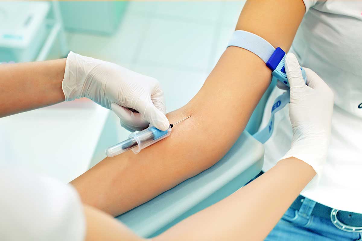 Phlebotomist drawing blood